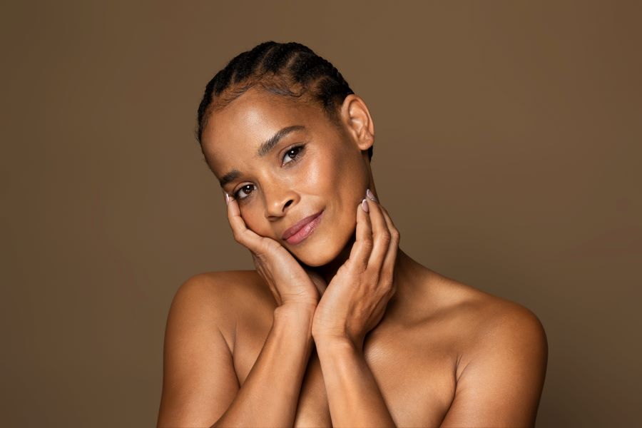 Middle age woman with cornrows and no makeup